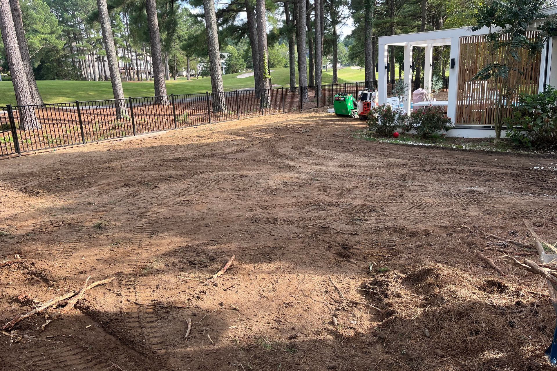 removing existing grass and three inches of the surface soil for artificial grass installation 