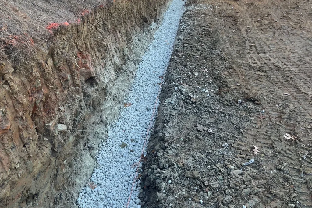 retaining wall on slop crearting 57 stone base